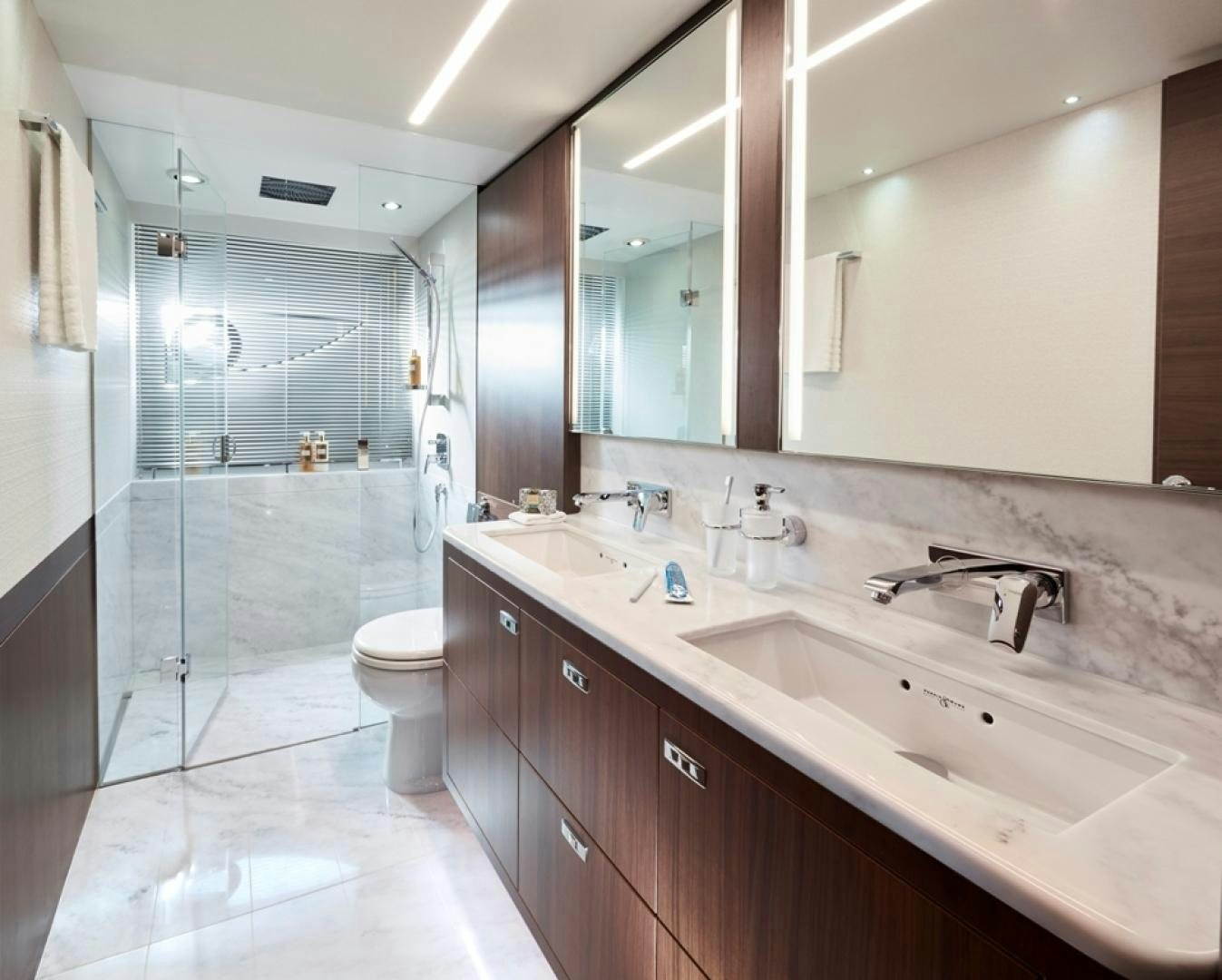 a bathroom with a glass shower aboard S78  Yacht for Sale