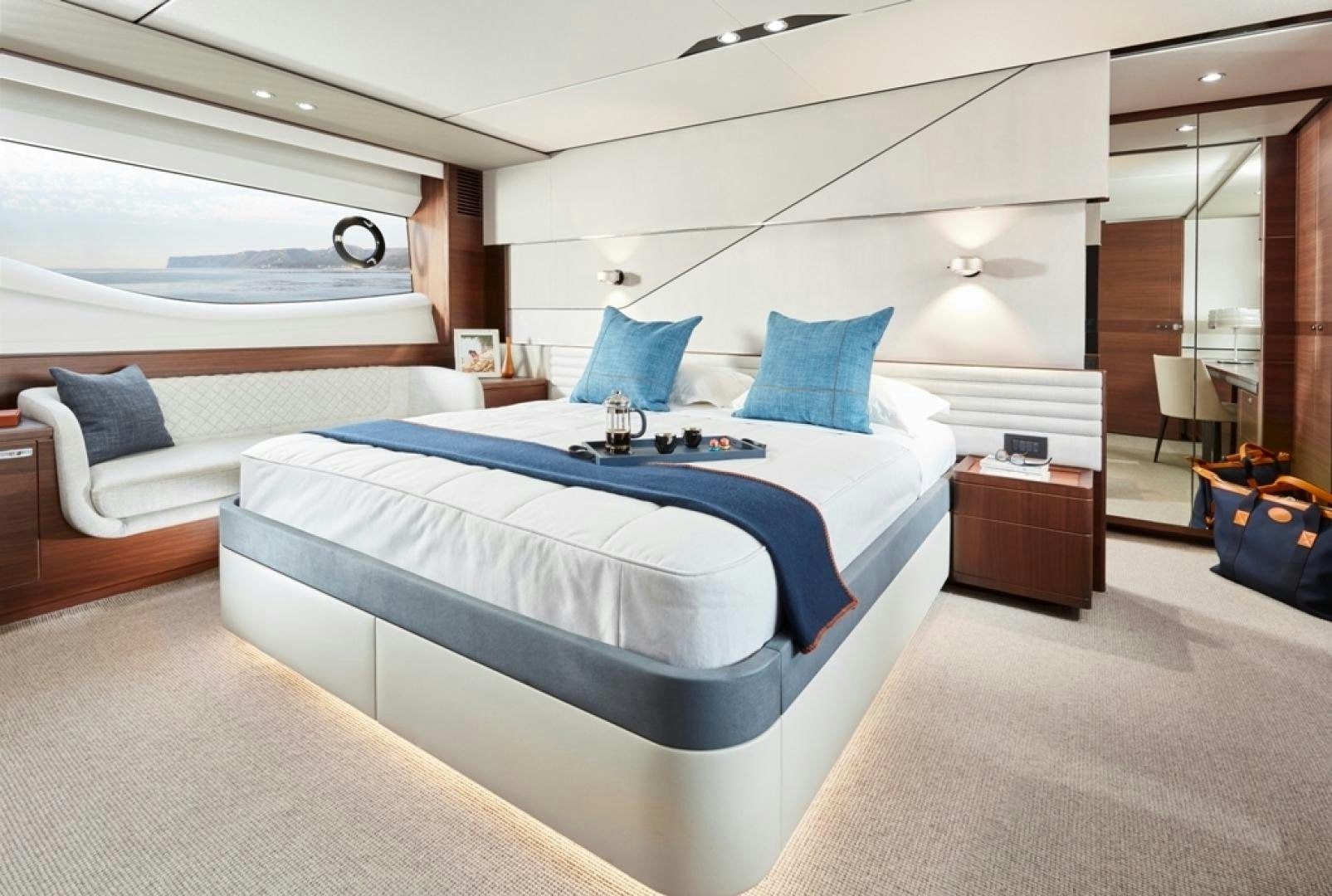 a room with a bed and a window aboard S78  Yacht for Sale