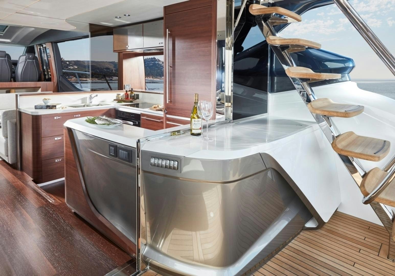 a kitchen with a large island aboard S78  Yacht for Sale