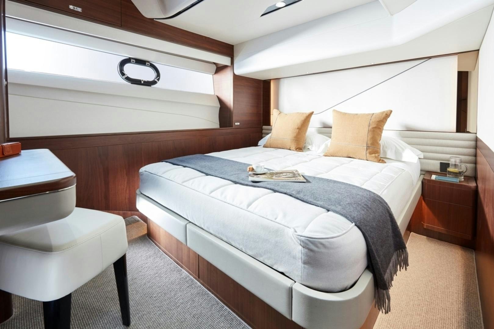 a bed with pillows aboard S78  Yacht for Sale