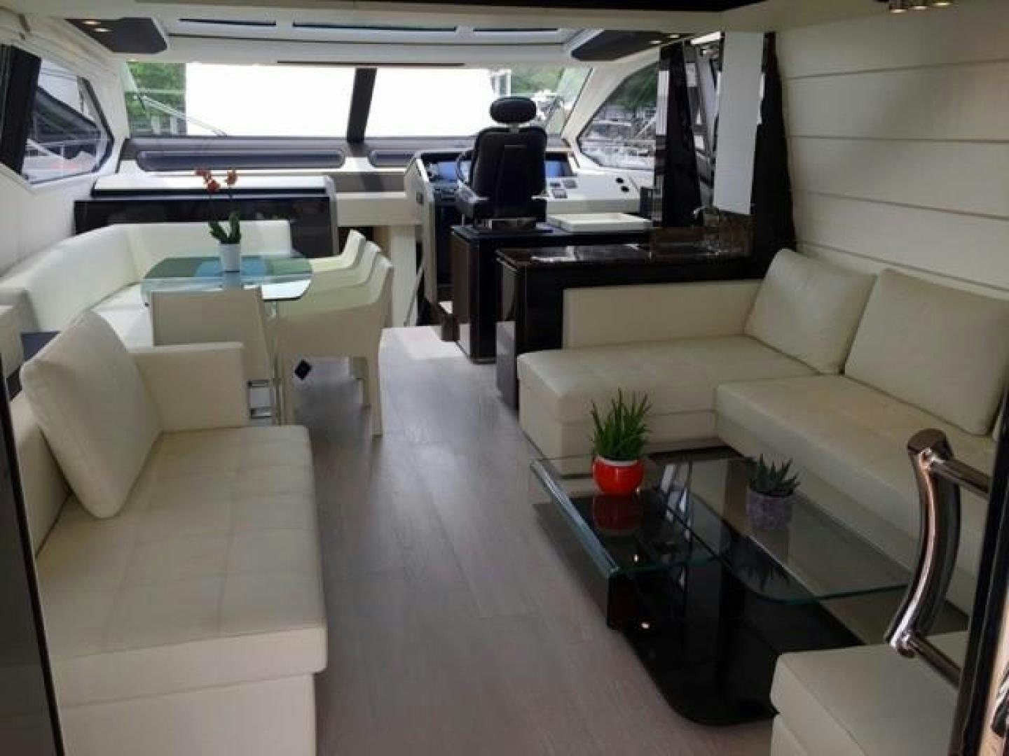 a car with a table and chairs aboard SILVER SKY 2.0 Yacht for Sale