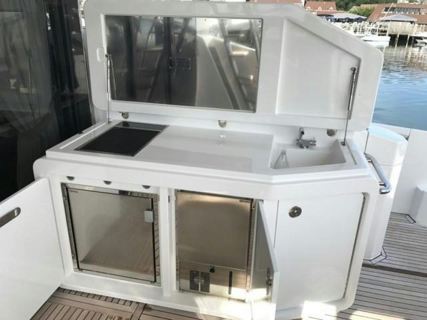 a white machine with a vent aboard SILVER SKY 2.0 Yacht for Sale
