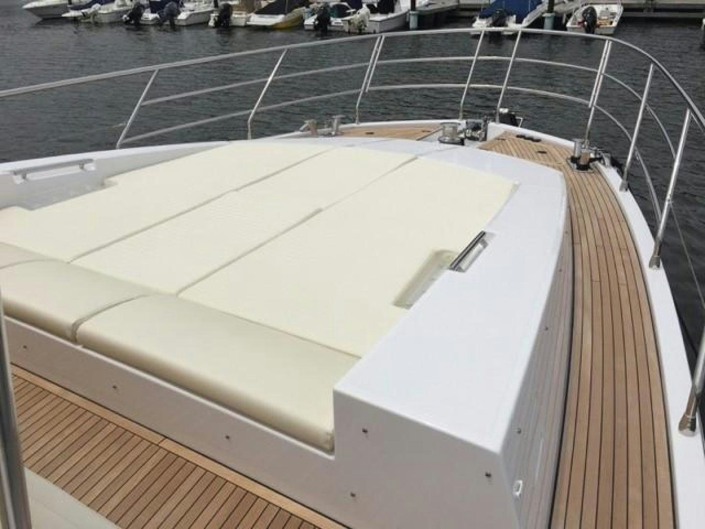 a white boat on a deck aboard SILVER SKY 2.0 Yacht for Sale