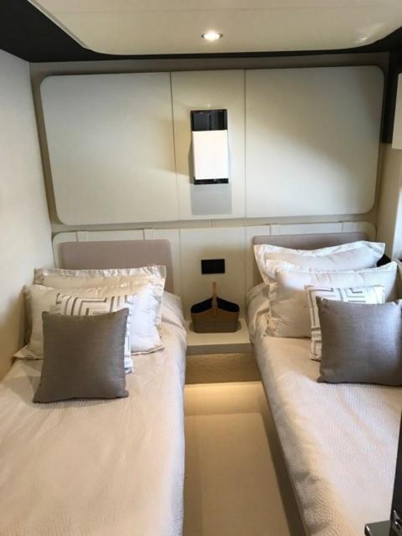 a room with two beds aboard SILVER SKY 2.0 Yacht for Sale