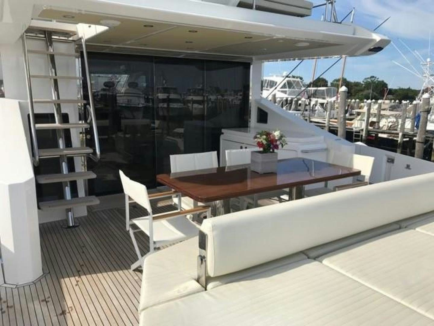 a room with a table and chairs aboard SILVER SKY 2.0 Yacht for Sale