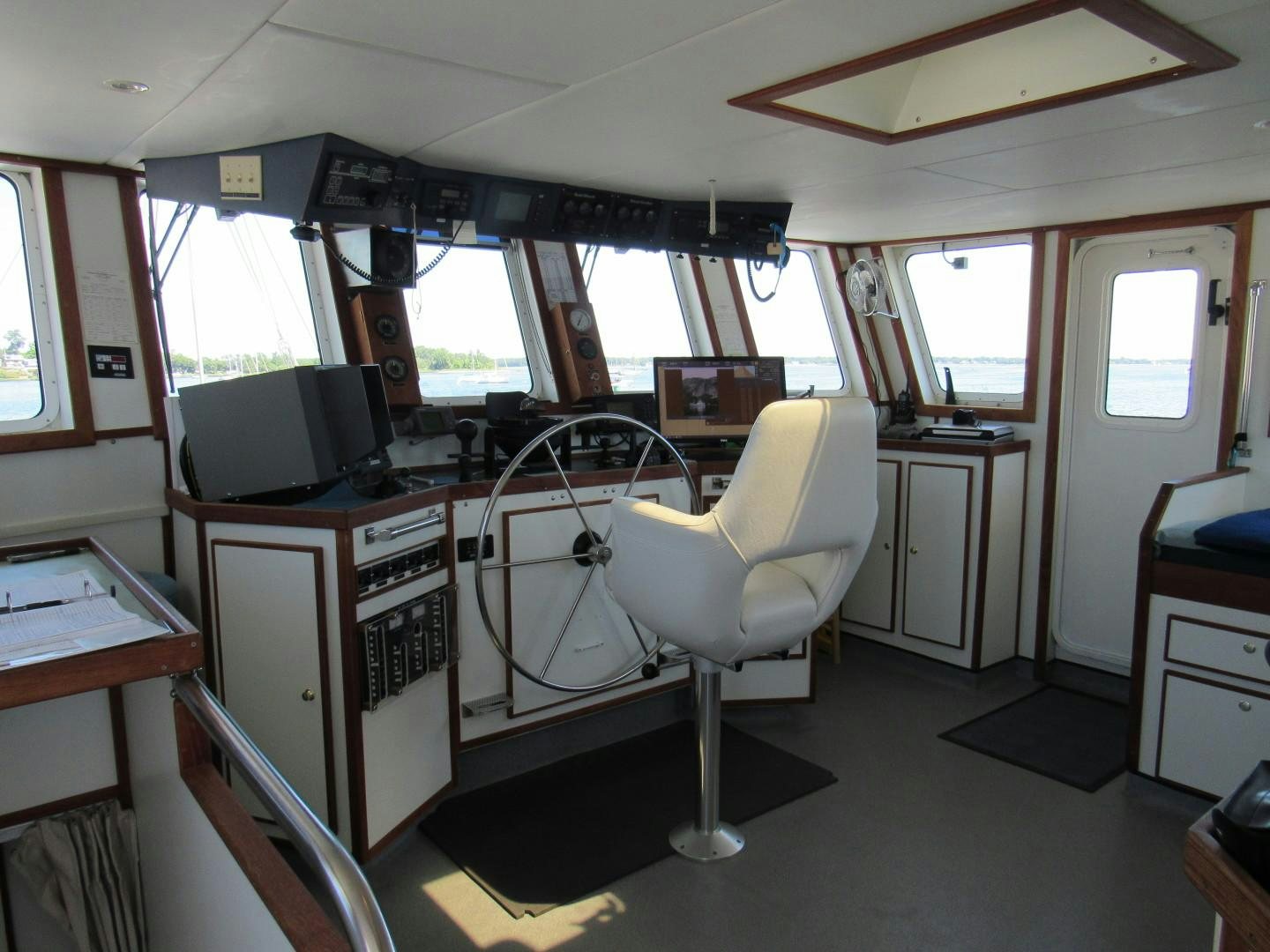 a room with a desk and a chair aboard KITTIWAKE Yacht for Sale