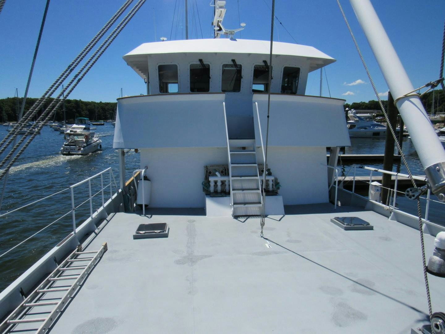 a boat on a dock aboard KITTIWAKE Yacht for Sale
