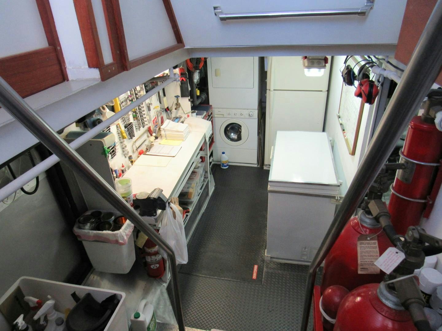 a room with shelves and equipment aboard KITTIWAKE Yacht for Sale