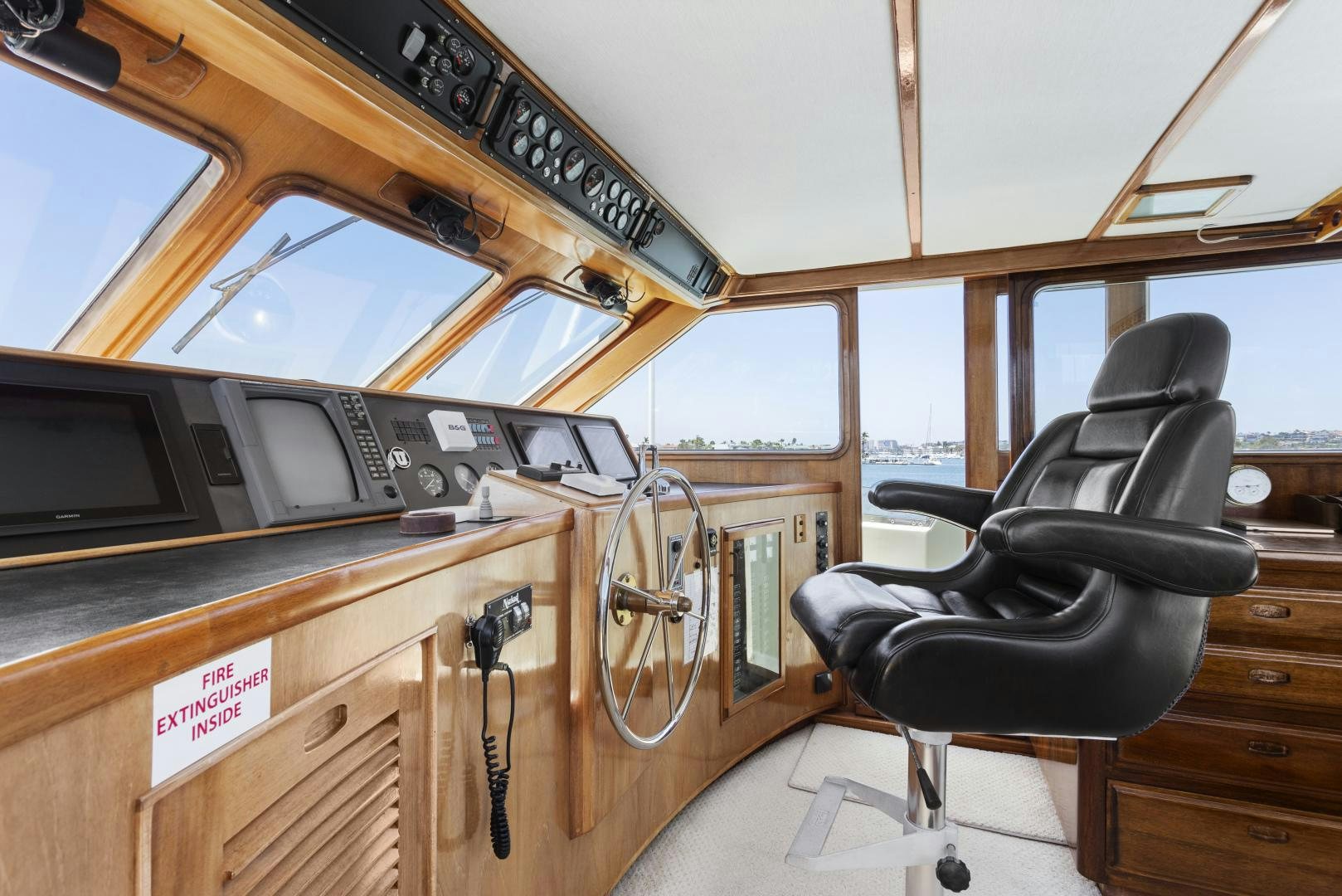 a chair in a room aboard EL AMO Yacht for Sale