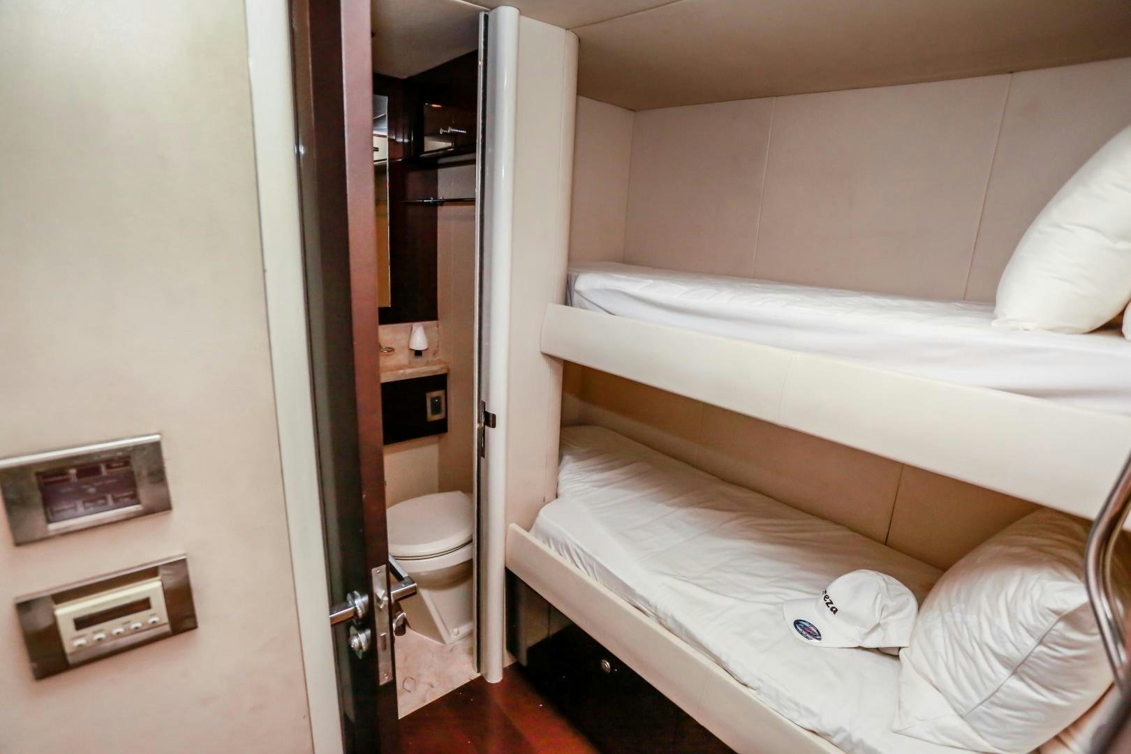 a room with a bed and a closet aboard TEREZA Yacht for Sale