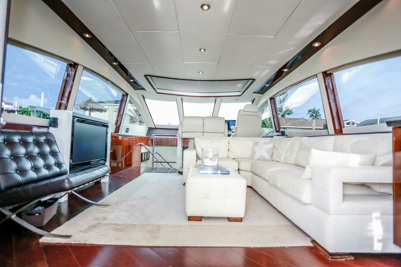 a living room with a large sofa aboard TEREZA Yacht for Sale