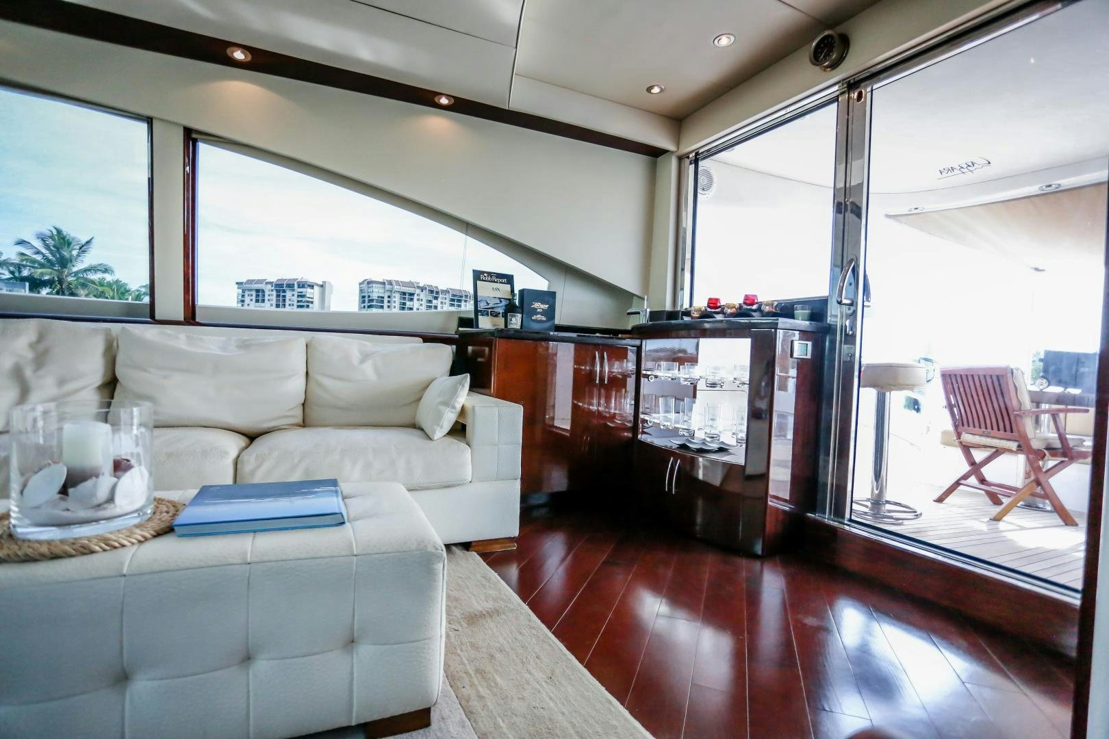 a living room with a wood floor aboard TEREZA Yacht for Sale