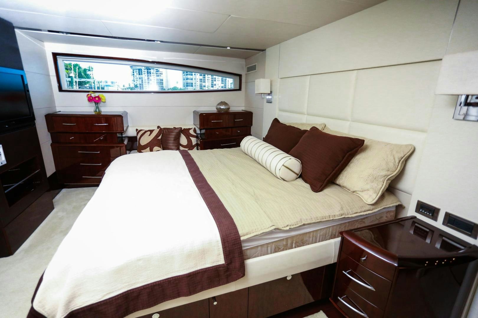a bedroom with a bed and a desk aboard TEREZA Yacht for Sale