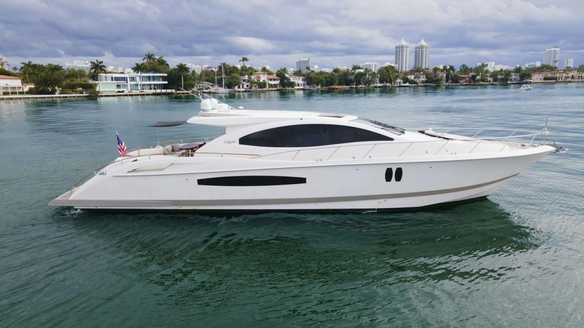 a white boat in the water aboard SALACIA Yacht for Sale