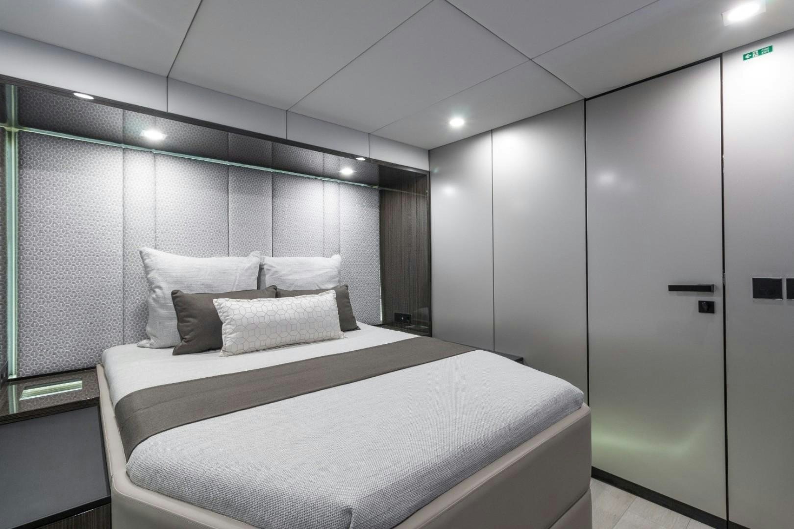 a bed in a room aboard OCEAN VIBES Yacht for Sale