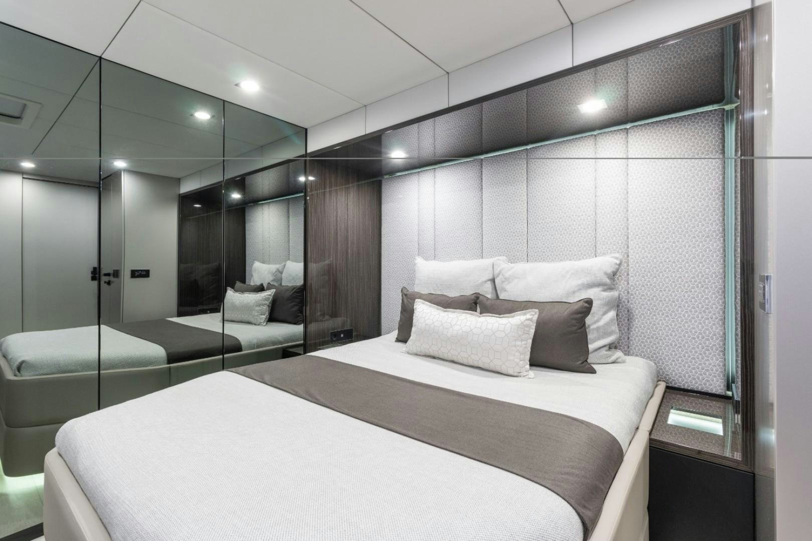 a bed in a room aboard OCEAN VIBES Yacht for Sale