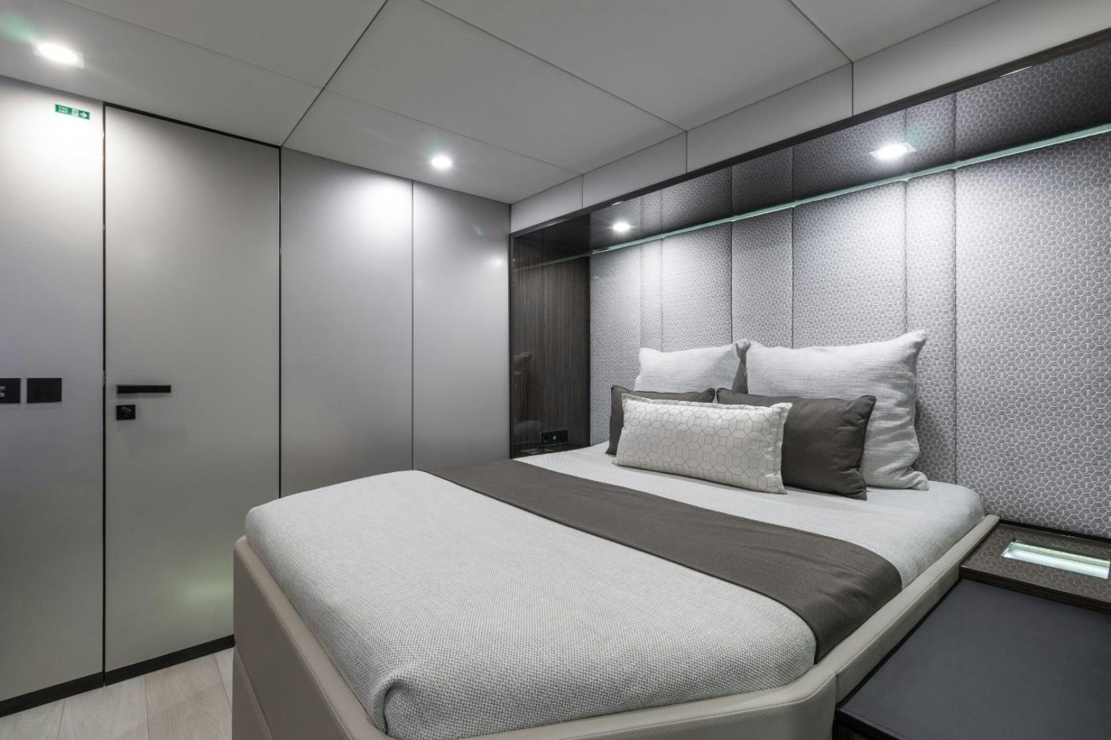 a bed in a room aboard OCEAN VIBES Yacht for Sale