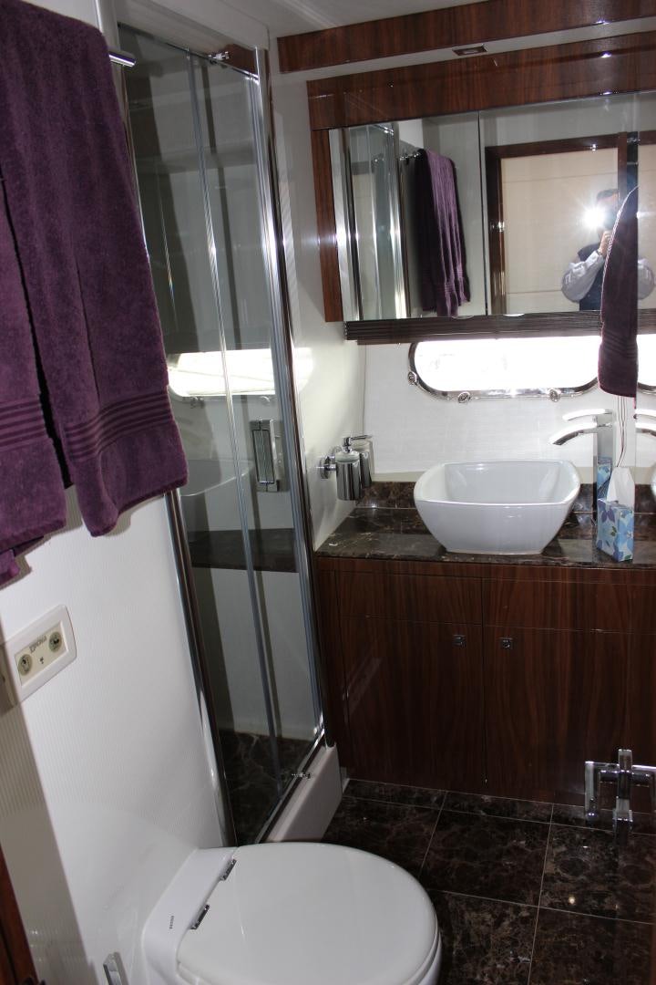 a bathroom with a sink and a toilet aboard GEMINI Yacht for Sale