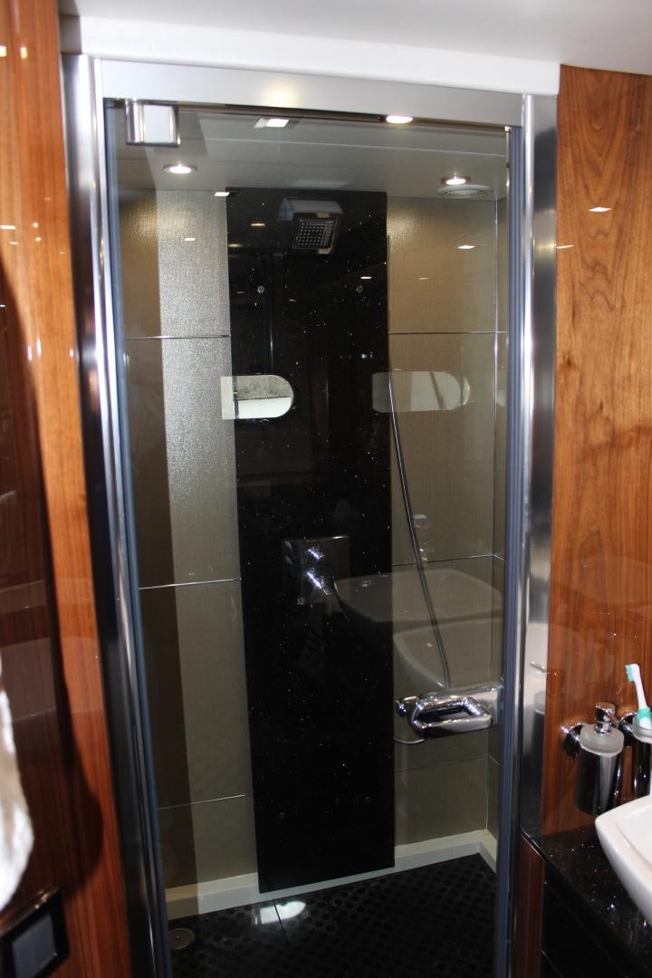 a shower unit with glass doors aboard GEMINI Yacht for Sale