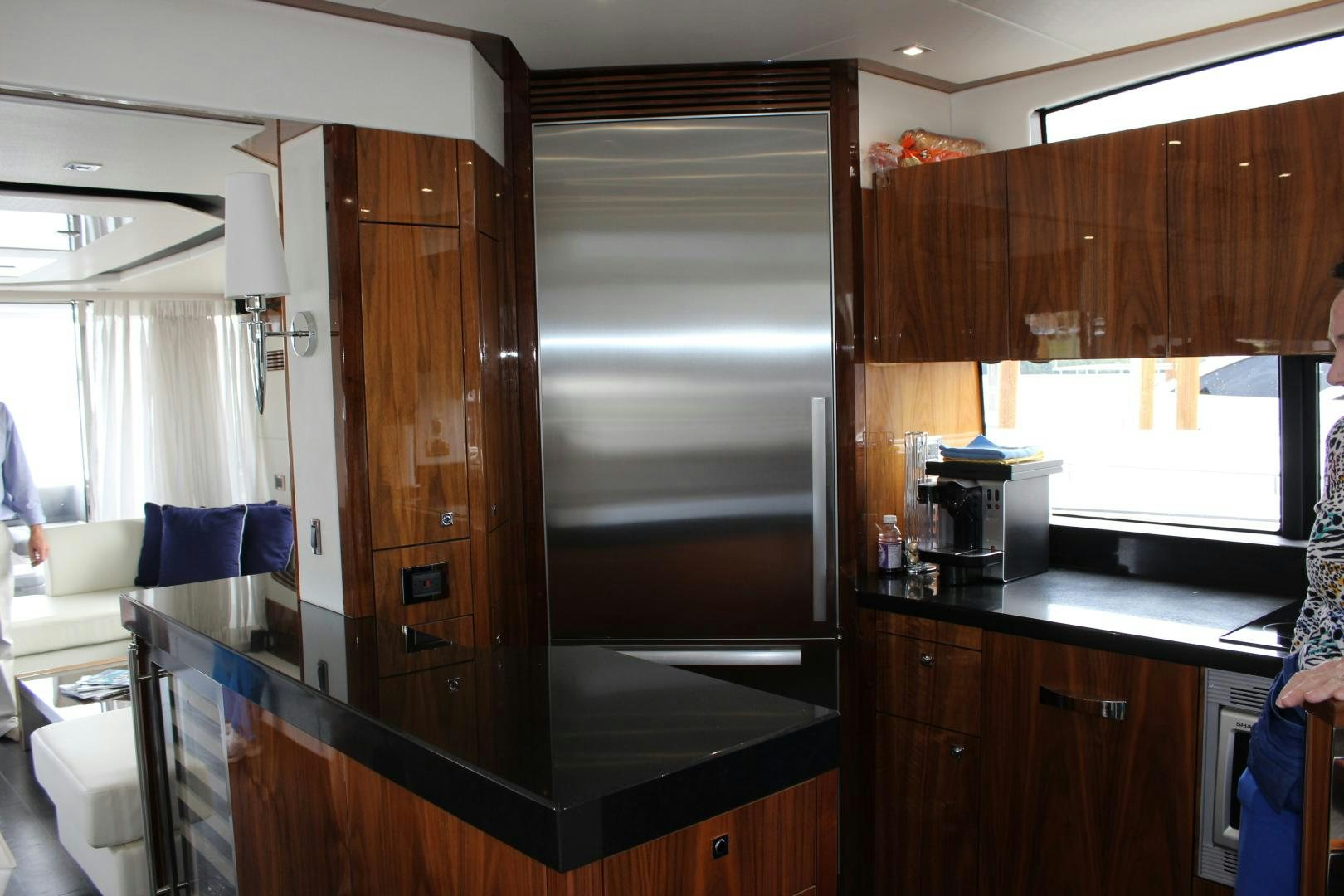 a kitchen with a large window aboard GEMINI Yacht for Sale