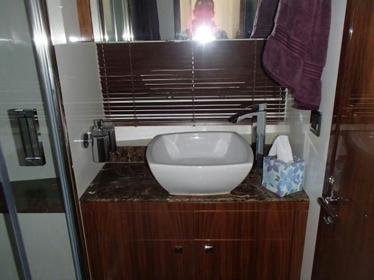 a sink in a bathroom aboard GEMINI Yacht for Sale
