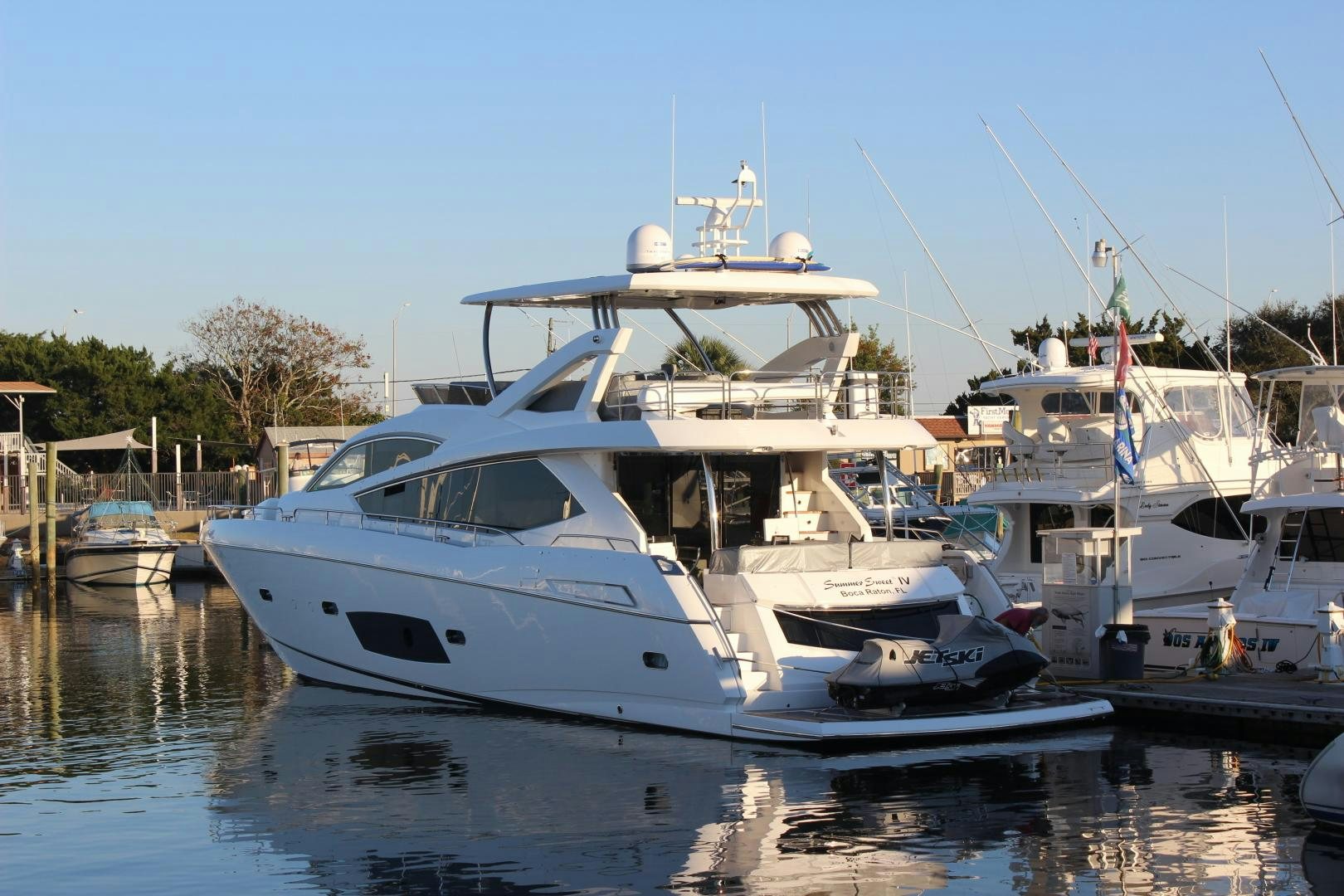 a group of boats are parked in a harbor aboard GEMINI Yacht for Sale