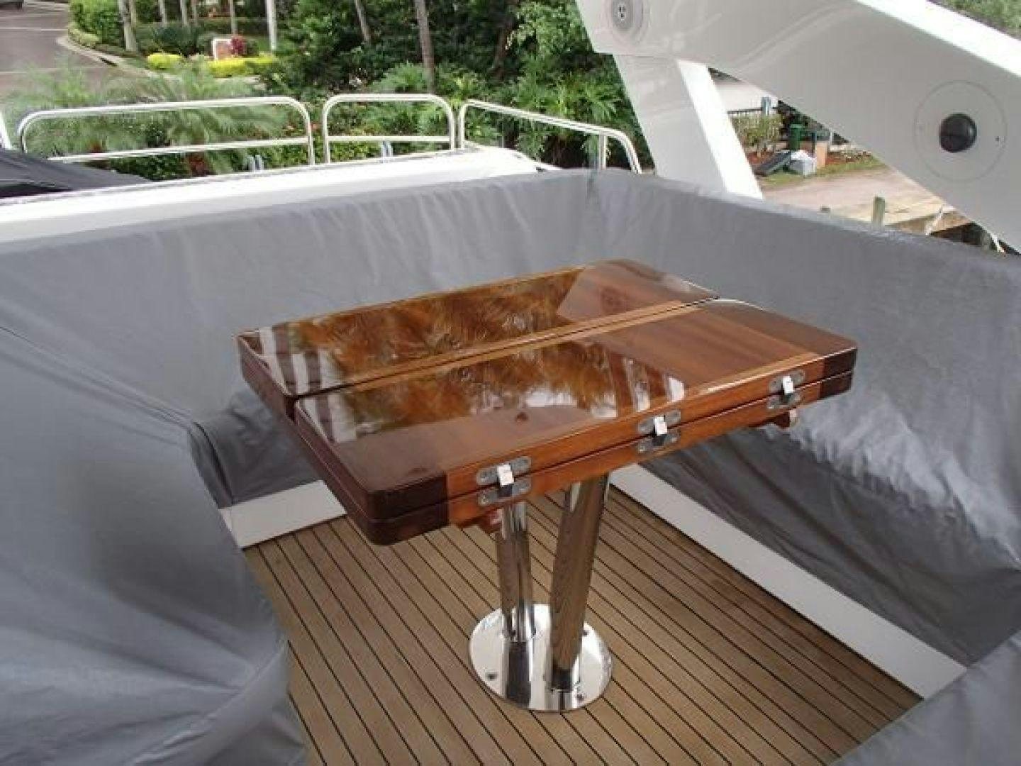 a wood grill on a car aboard GEMINI Yacht for Sale