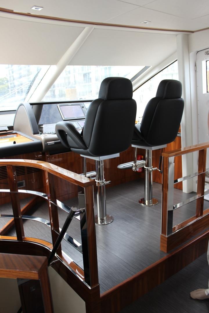 a room with chairs and desks aboard GEMINI Yacht for Sale