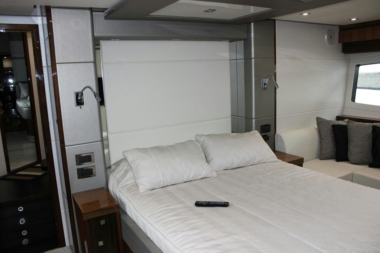 a bed in a room aboard GEMINI Yacht for Sale