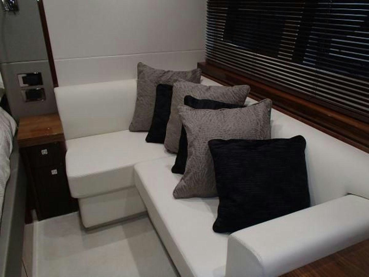 a couch with pillows aboard GEMINI Yacht for Sale