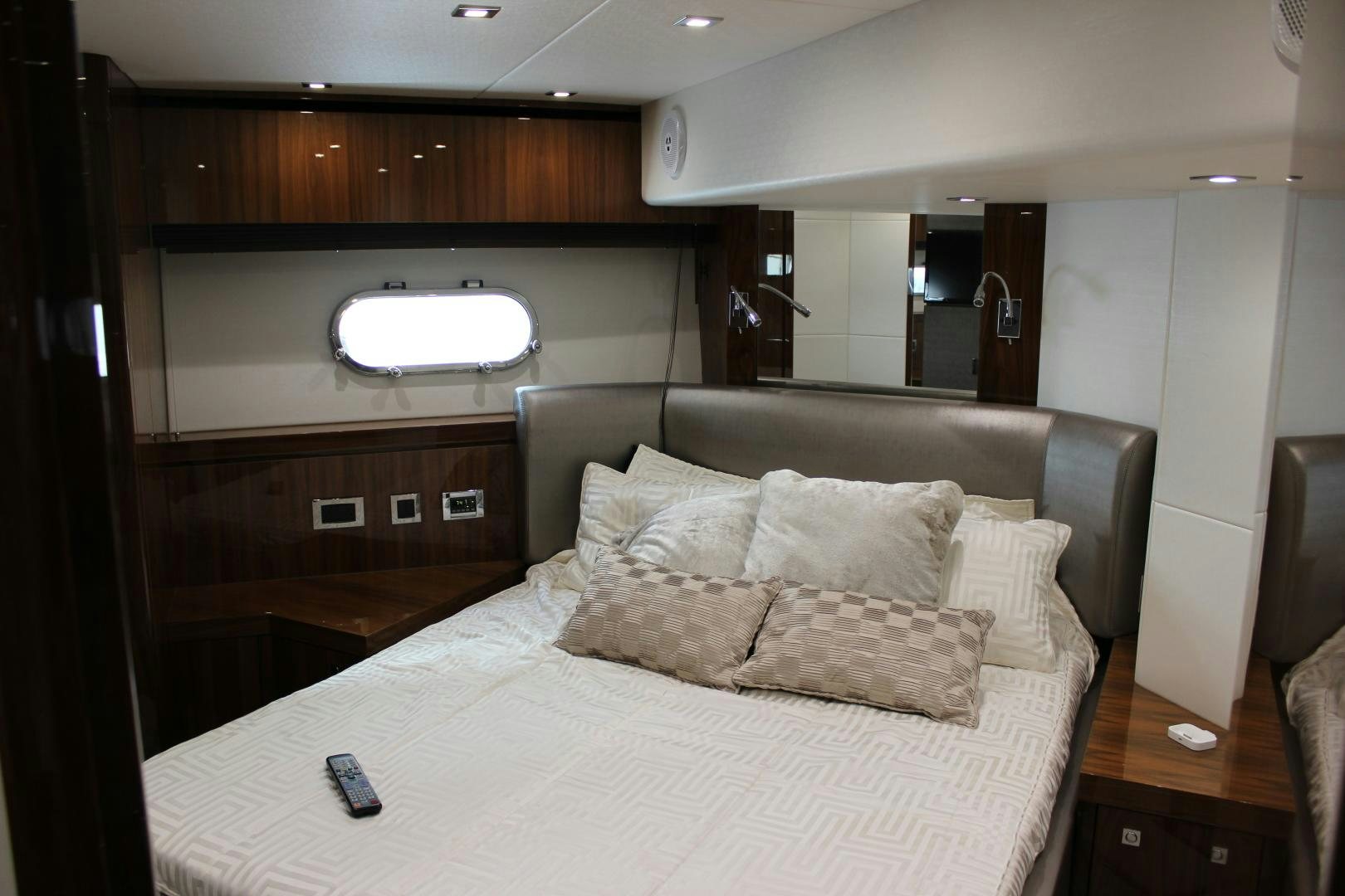 a bed with pillows aboard GEMINI Yacht for Sale
