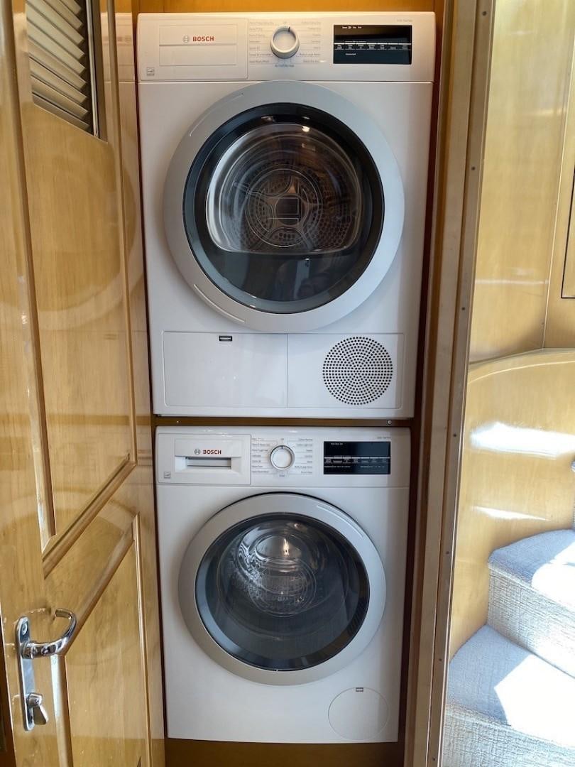 a washing machine in a closet aboard   Yacht for Sale
