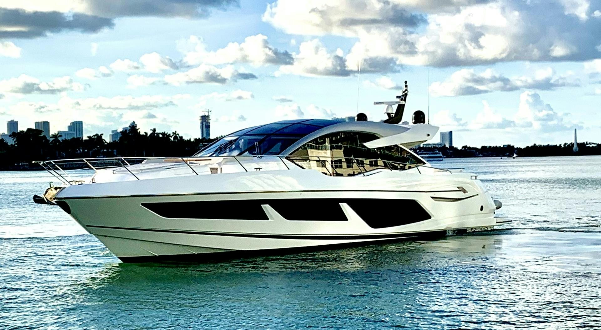 a white yacht in the water aboard STRATEGIC DREAMS Yacht for Sale
