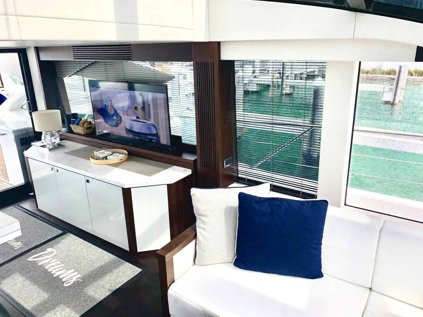 a room with a bed and a tv aboard STRATEGIC DREAMS Yacht for Sale