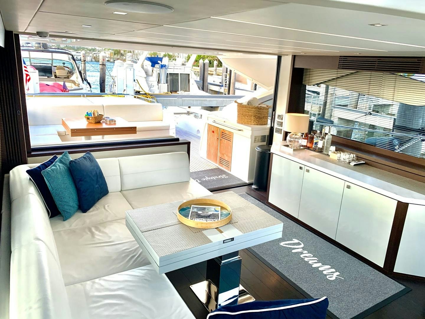 a room with a couch and a table aboard STRATEGIC DREAMS Yacht for Sale
