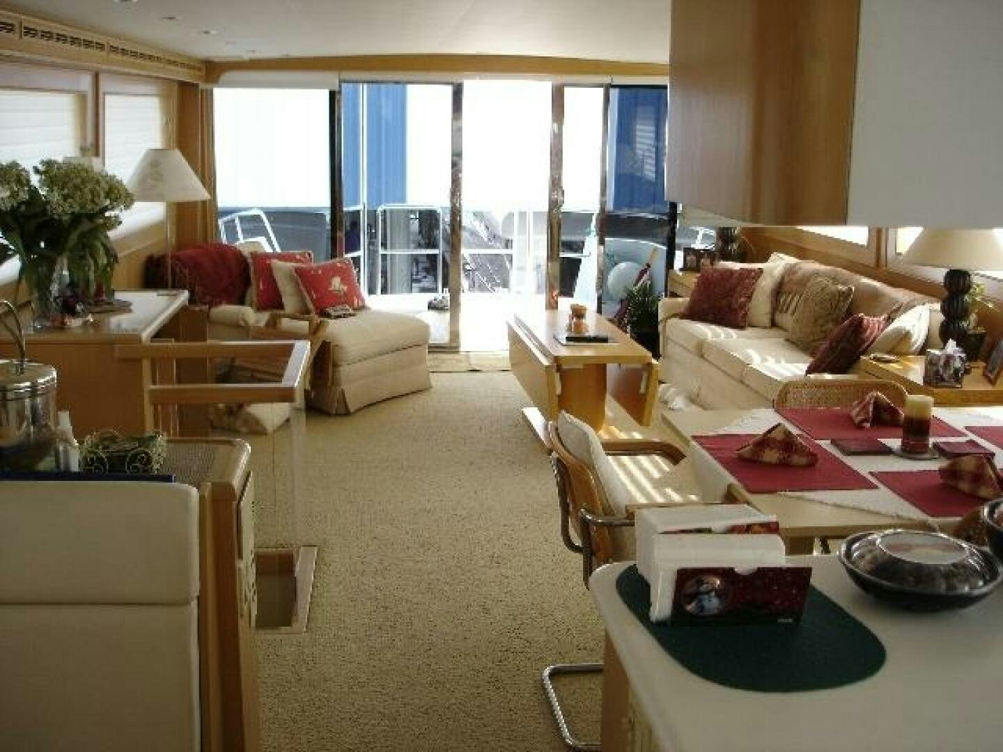 a living room with a table and chairs aboard WHALE'S WAY Yacht for Sale
