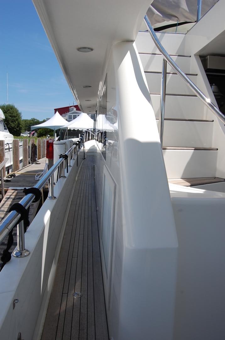 a white staircase with railings aboard HATT TRICK Yacht for Sale