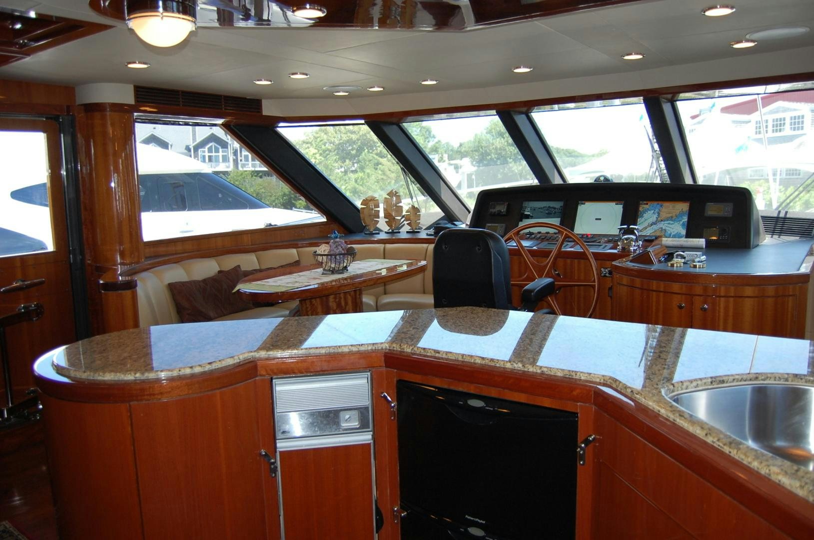 a kitchen with a sink and cabinets aboard HATT TRICK Yacht for Sale
