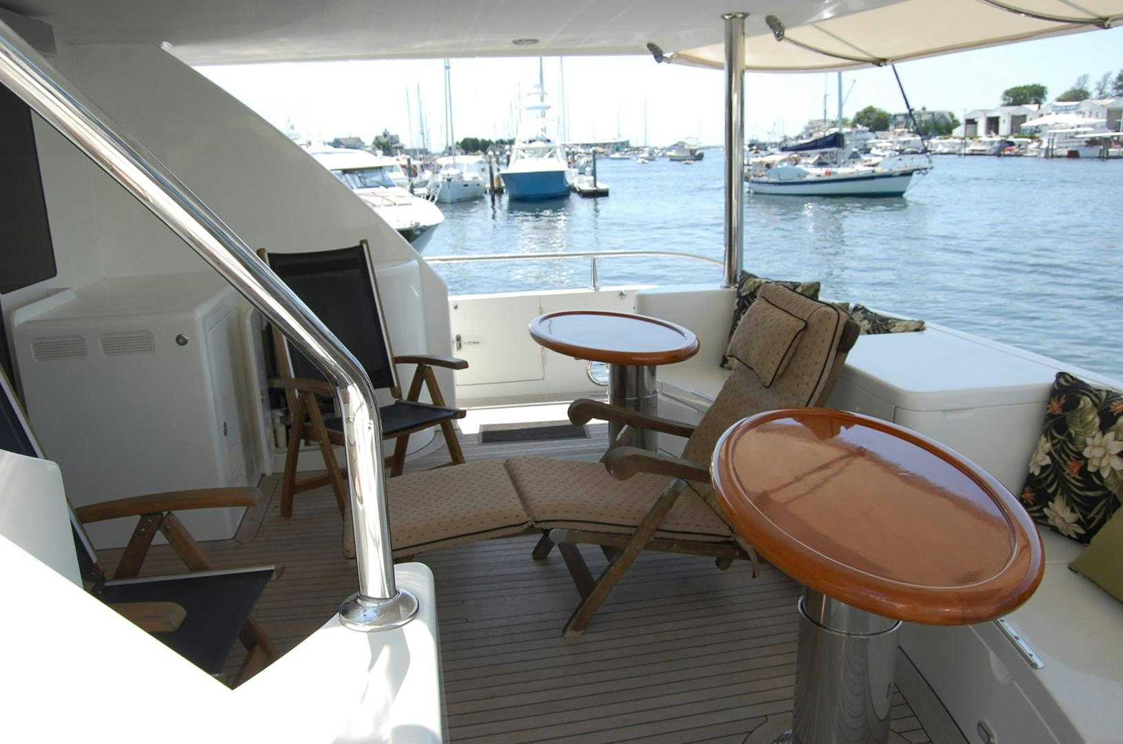 a table and chairs on a boat aboard HATT TRICK Yacht for Sale