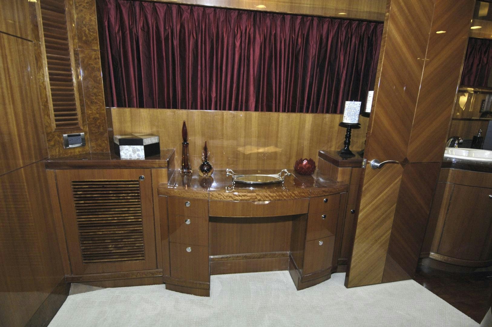 a kitchen with wooden cabinets aboard HATT TRICK Yacht for Sale