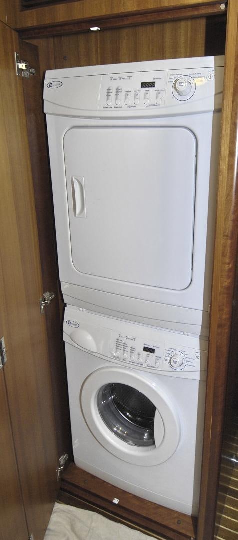 a white washing machine aboard HATT TRICK Yacht for Sale