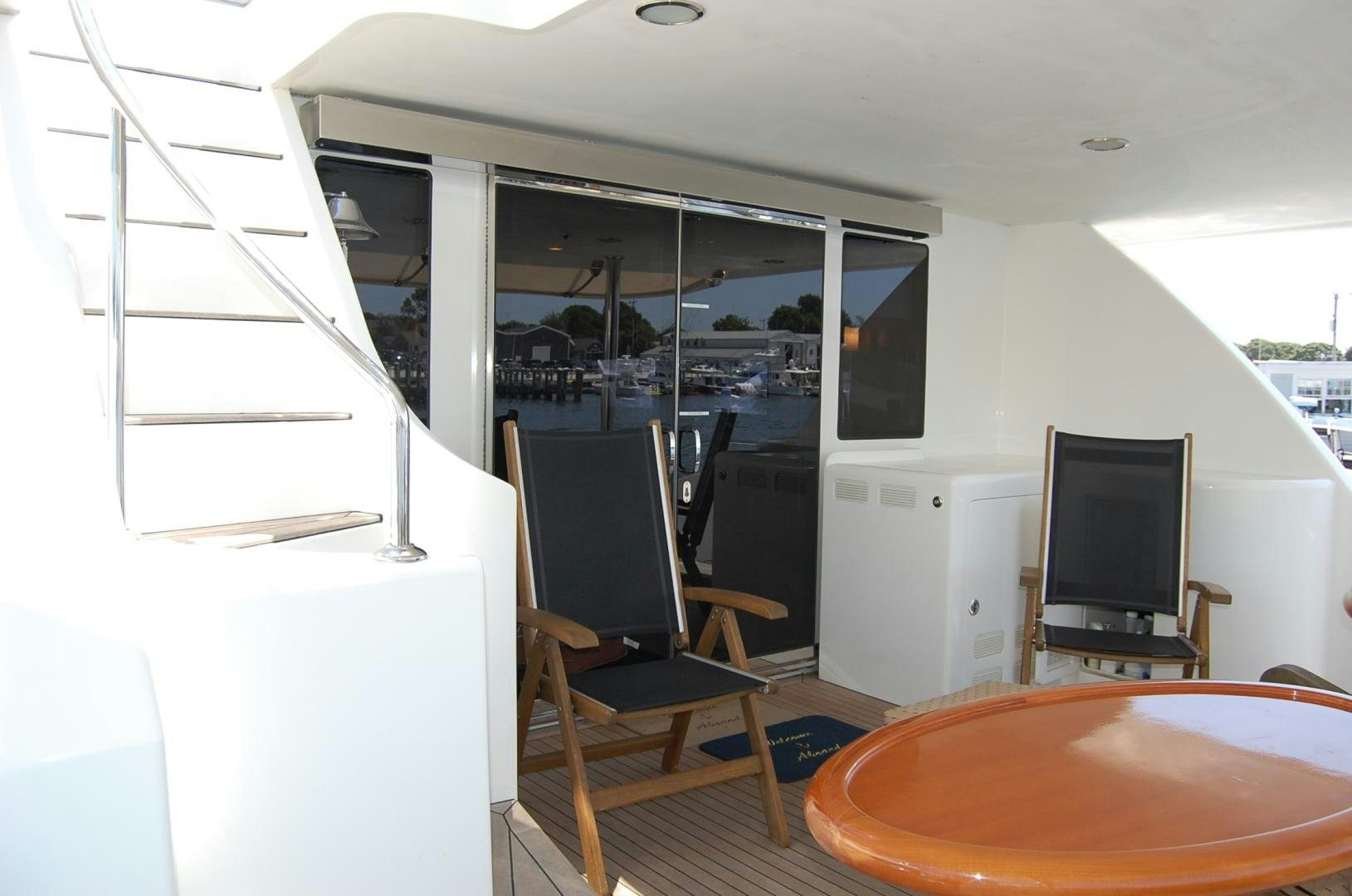 a room with a table and chairs aboard HATT TRICK Yacht for Sale