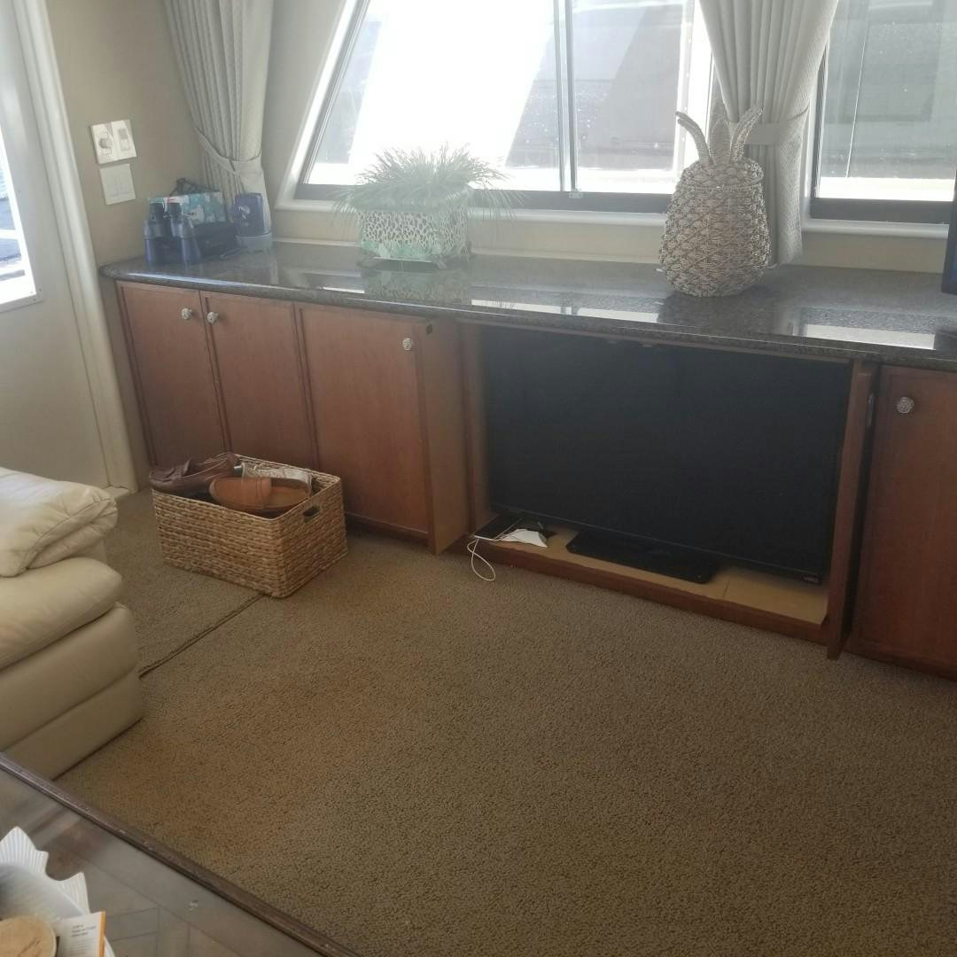 a kitchen with a black counter aboard CAROLINA WIND Yacht for Sale