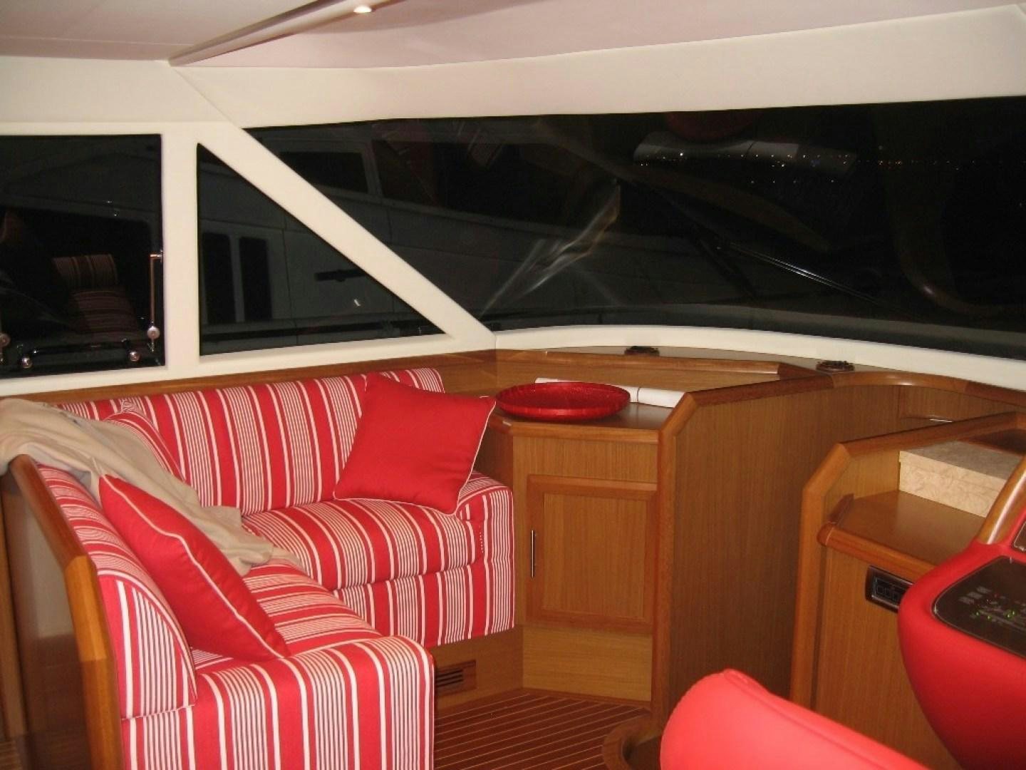 a room with a couch and a table aboard No Name Yacht for Sale