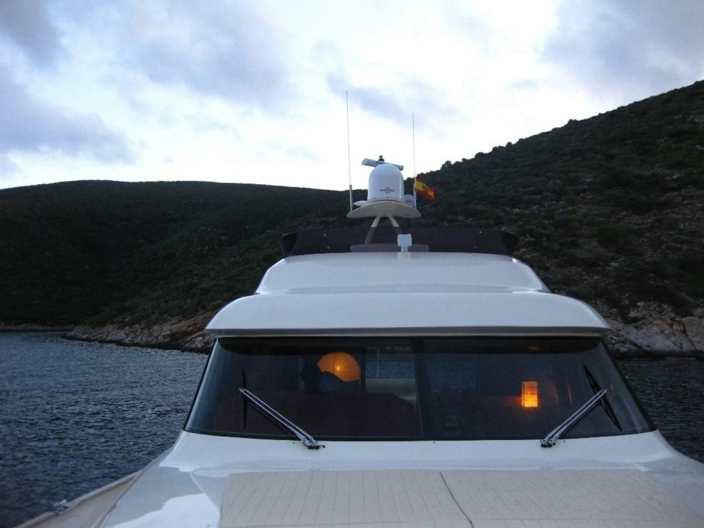 a boat with a lighthouse on it aboard No Name Yacht for Sale