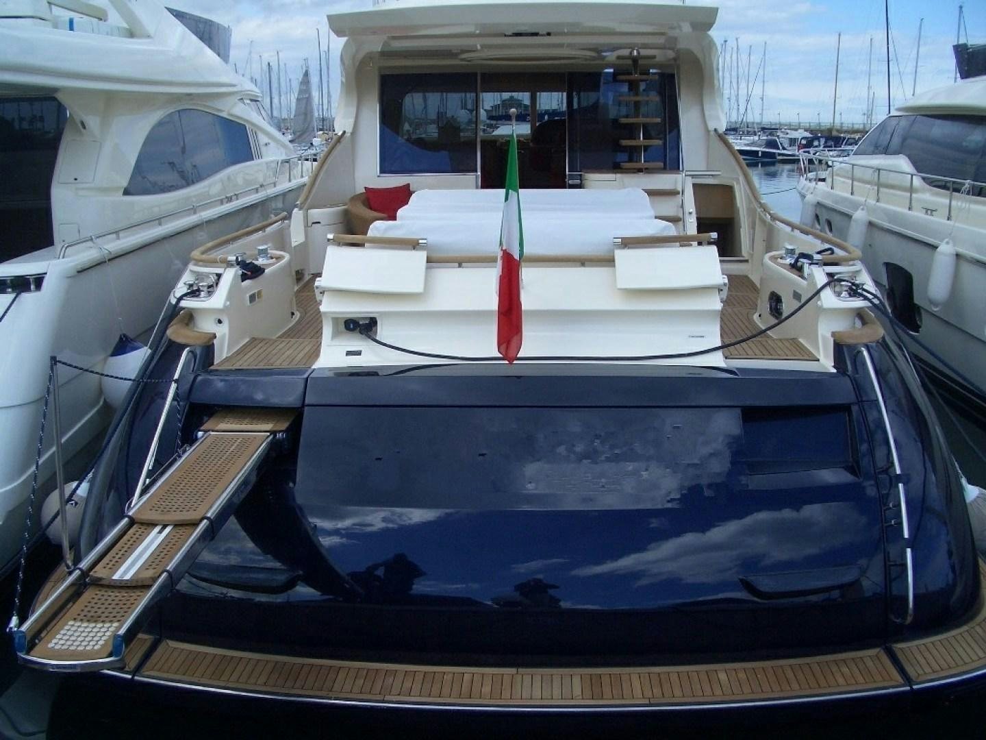 a boat with a red stripe aboard No Name Yacht for Sale