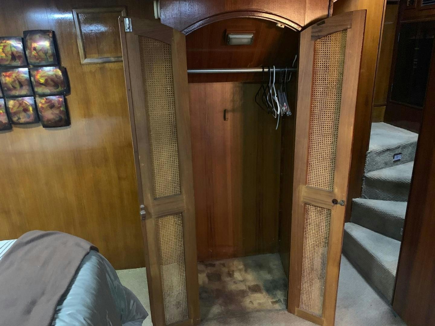 a room with a wood door aboard No Name Yacht for Sale