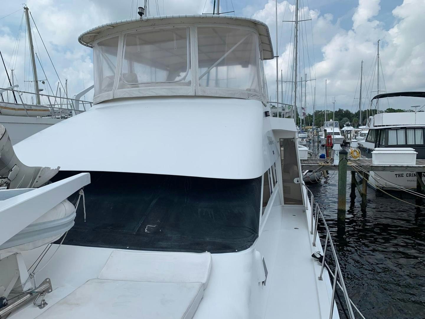 a boat docked at a pier aboard No Name Yacht for Sale