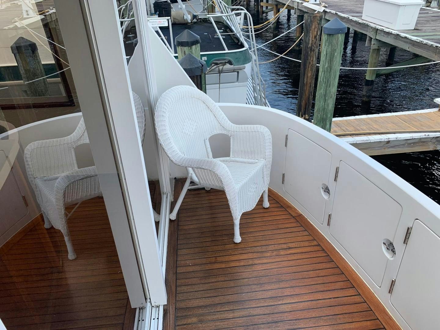 a white chair on a deck aboard No Name Yacht for Sale