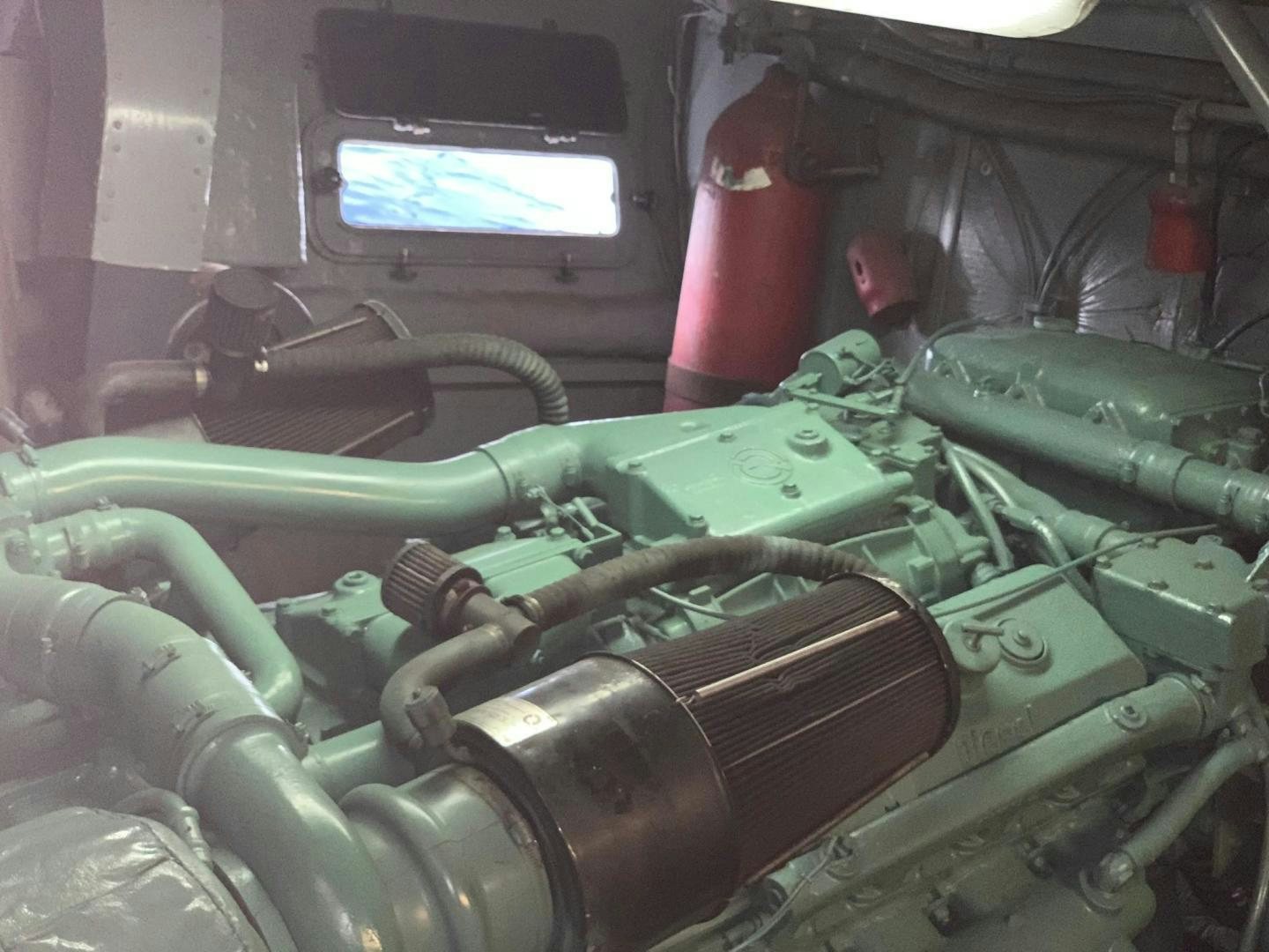 a close-up of a car engine aboard No Name Yacht for Sale